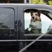 A dog waits in the front seat of a parked truck at Arbor Hills shopping center on Washtenaw Ave. on Thursday, August 8, 2013. Melanie Maxwell | AnnArbor.com